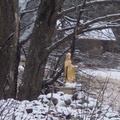 Buddha at the kuti in the snow