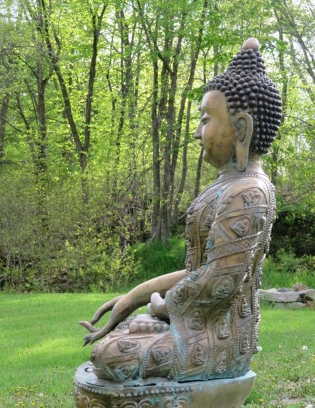 Buddha statue in the meadow.JPG