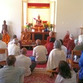 Ajahn Amaro giving a teaching in the Meditation Hall May 2018.JPG