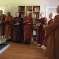 Ajahn Amaro joins us to receive dana in the house.jpeg