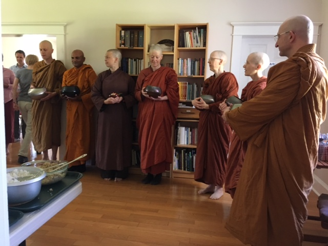 Ajahn Amaro joins us to receive dana in the house.jpeg